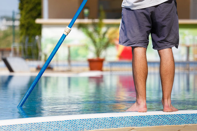 Man doing local pool cleaning service